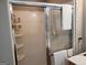 Shower stall with glass door and tiled walls at 4767 Glenwhite Dr, Duluth, GA 30096