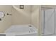 Bathroom with corner bathtub and shower at 701 Brambling Way, Stockbridge, GA 30281