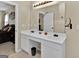 Double vanity bathroom with large mirror and separate shower at 701 Brambling Way, Stockbridge, GA 30281