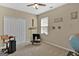 Bedroom with desk, globe, and double door closet at 701 Brambling Way, Stockbridge, GA 30281