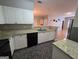 Kitchen with granite countertops and white cabinets at 101 Spring Heights Ln, Smyrna, GA 30080