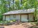 Detached three-car garage with metal siding at 95 Fern Ct, Stockbridge, GA 30281