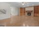 Living area with hardwood floors, fireplace, and built-ins at 95 Fern Ct, Stockbridge, GA 30281