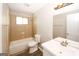 Updated bathroom with a bathtub, toilet, and vanity at 3130 Mars Hill Rd, Acworth, GA 30101