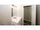 Clean bathroom with single sink vanity and shower/tub combo at 3130 Mars Hill Rd, Acworth, GA 30101