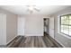 Bright bedroom with ceiling fan and two closets at 3130 Mars Hill Rd, Acworth, GA 30101