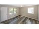 Bedroom with vinyl plank flooring and windows at 3130 Mars Hill Rd, Acworth, GA 30101