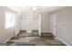 Spacious bedroom with ample closet space and wood-look flooring at 3130 Mars Hill Rd, Acworth, GA 30101