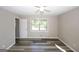 Bedroom with ceiling fan and large window, offering natural light at 3130 Mars Hill Rd, Acworth, GA 30101