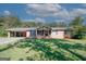 Brick ranch house with carport and spacious lawn at 3130 Mars Hill Rd, Acworth, GA 30101