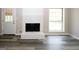 Living room with white brick fireplace at 3130 Mars Hill Rd, Acworth, GA 30101