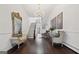 Elegant entryway featuring hardwood floors and ornate mirror at 3115 Pennington Sw St, Covington, GA 30014