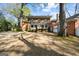 Brick house with a detached garage and large yard at 3115 Pennington Sw St, Covington, GA 30014