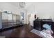 Laundry room with washer, dryer, and dark hardwood floors at 3115 Pennington Sw St, Covington, GA 30014