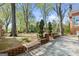 Brick patio with benches and mature trees at 3115 Pennington Sw St, Covington, GA 30014