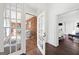 Sunroom with French doors leading to living area at 3115 Pennington Sw St, Covington, GA 30014