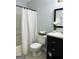 Bathroom with updated vanity, toilet, and shower/tub combo at 7665 Antebellum Ln, Riverdale, GA 30274