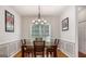 Bright dining room with hardwood floors, chandelier, and wainscoting at 78 Bisbee Se Ave, Atlanta, GA 30315