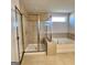 Spa-like bathroom with a large walk-in shower and soaking tub at 212 Himalaya Way, Mcdonough, GA 30253