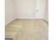 Bright bedroom with carpet and neutral walls at 212 Himalaya Way, Mcdonough, GA 30253