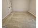 Simple bedroom with neutral walls and carpet at 212 Himalaya Way, Mcdonough, GA 30253