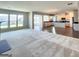 Open concept kitchen with island and stainless steel appliances at 212 Himalaya Way, Mcdonough, GA 30253