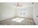 Bright bedroom with carpet and a ceiling fan at 13 Forest Ridge Ct, Sandy Springs, GA 30350