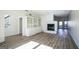 Living room with built-in shelving and a fireplace at 13 Forest Ridge Ct, Sandy Springs, GA 30350