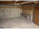 Unfinished basement area with workbench and storage cabinets at 216 Rivers Rd, Fayetteville, GA 30214