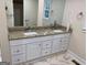 Bathroom with double vanity and granite countertop at 216 Rivers Rd, Fayetteville, GA 30214