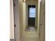 Long hallway with access to bedrooms at 216 Rivers Rd, Fayetteville, GA 30214