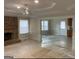 Spacious living room with fireplace and open floor plan at 216 Rivers Rd, Fayetteville, GA 30214