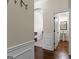 Clean bathroom with pedestal sink and hardwood floors at 801 Carnegie Ct, Locust Grove, GA 30248