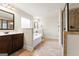 Elegant bathroom with double vanity, soaking tub, and separate shower at 801 Carnegie Ct, Locust Grove, GA 30248