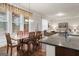 Kitchen and breakfast area with hardwood floors and lots of light at 801 Carnegie Ct, Locust Grove, GA 30248