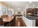 Modern kitchen with granite countertops and stainless steel appliances at 801 Carnegie Ct, Locust Grove, GA 30248