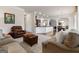 Open living room showcasing a view of the kitchen and dining area at 801 Carnegie Ct, Locust Grove, GA 30248