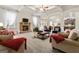 Open living room with a stone fireplace and ample seating at 801 Carnegie Ct, Locust Grove, GA 30248