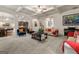Spacious living area with hardwood floors and open floor plan at 801 Carnegie Ct, Locust Grove, GA 30248