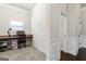 Small home office with built-in desk and hardwood floors at 801 Carnegie Ct, Locust Grove, GA 30248