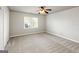 Charming bedroom with carpet flooring and a window at 5615 Forkwood Nw Dr, Acworth, GA 30101