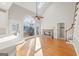 Breakfast area with vaulted ceiling, stone fireplace and hardwood floors at 5615 Forkwood Nw Dr, Acworth, GA 30101