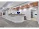 Basement bar with granite countertop, copper ceiling, and mini-refrigerator at 180 Wesley Forest Dr, Fayetteville, GA 30214