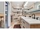 Spa-like bathroom with double vanity, marble countertops, and a walk-in shower at 180 Wesley Forest Dr, Fayetteville, GA 30214