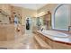 Luxurious bathroom featuring a soaking tub and walk-in shower at 180 Wesley Forest Dr, Fayetteville, GA 30214