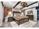 Luxurious bedroom with a large bed and elegant decor at 180 Wesley Forest Dr, Fayetteville, GA 30214