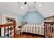 Bright bedroom with wood floors, crib, and built-ins at 180 Wesley Forest Dr, Fayetteville, GA 30214