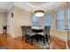 Bright breakfast nook features a marble table and seating for six at 180 Wesley Forest Dr, Fayetteville, GA 30214