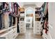 Spacious walk-in closet with ample shelving and hanging space at 180 Wesley Forest Dr, Fayetteville, GA 30214