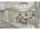 Basement dining area with large windows and a marble floor at 180 Wesley Forest Dr, Fayetteville, GA 30214